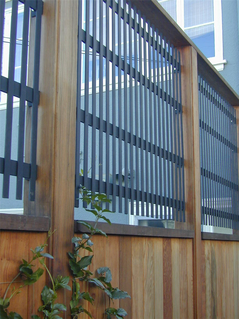 Wood Wall with Metal Fence Cap