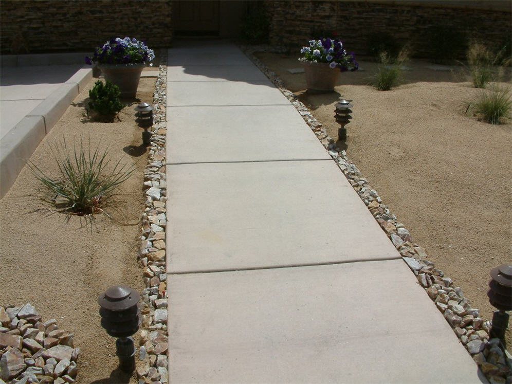 Square Pads Flanked by Pebbles