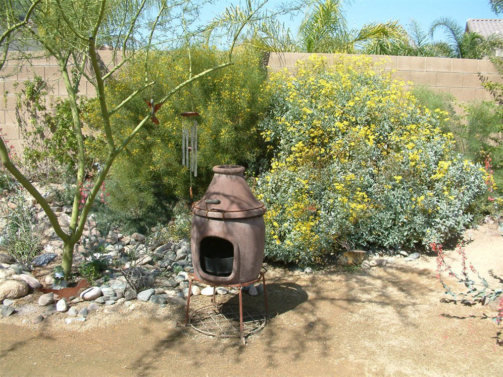 Outdoor Fireplace and Wind Chimes